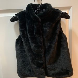 Black faux fur vest